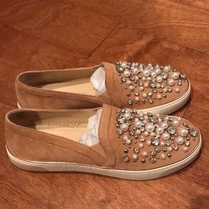 Stuart Weitzman suede slip-on sneaker.